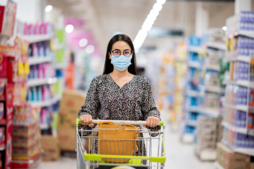 premises liability woman shopping in supermarket business with shopping cart