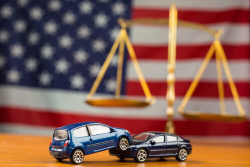 car accident toy cars gavel American flag